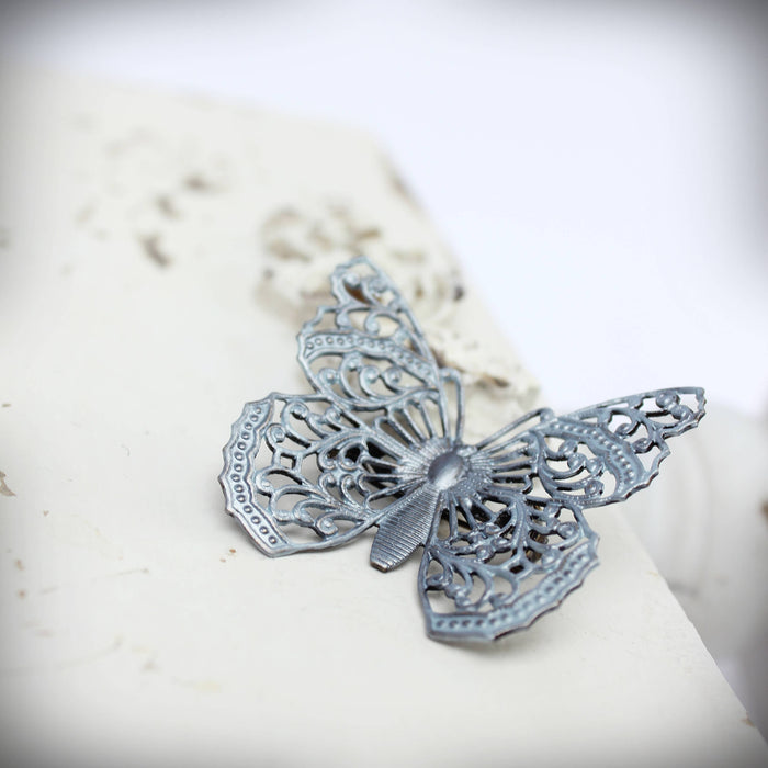 Circa 1890 - Frosty Blue Filigree Butterfly Brooch
