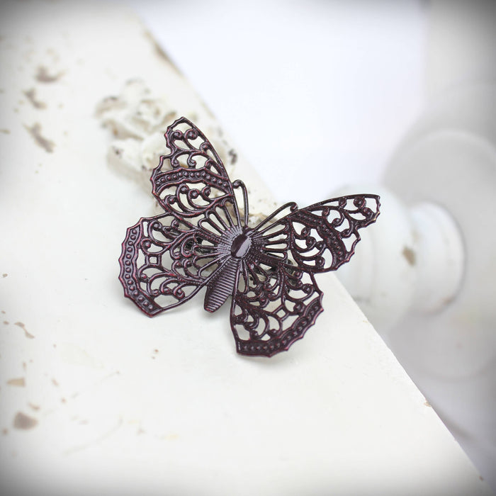 Circa 1890 - Burgundy Filigree Butterfly Brooch
