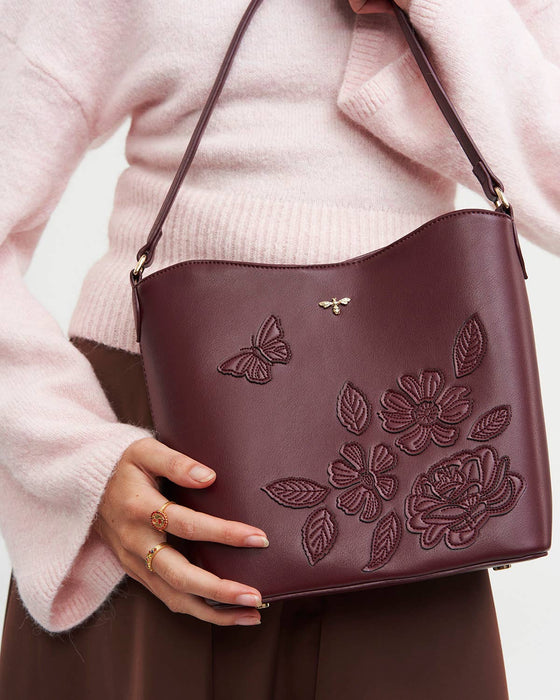 Fable England Burgundy Floral Faux Leather Bucket Bag | Margot