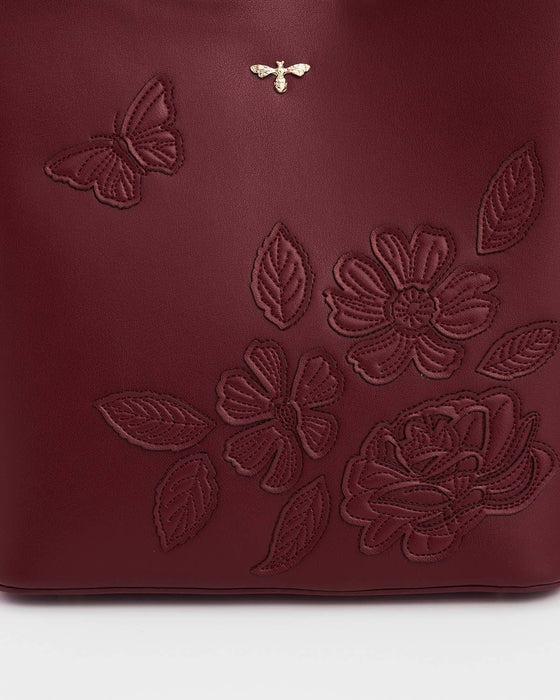 Fable England Burgundy Floral Faux Leather Bucket Bag | Margot