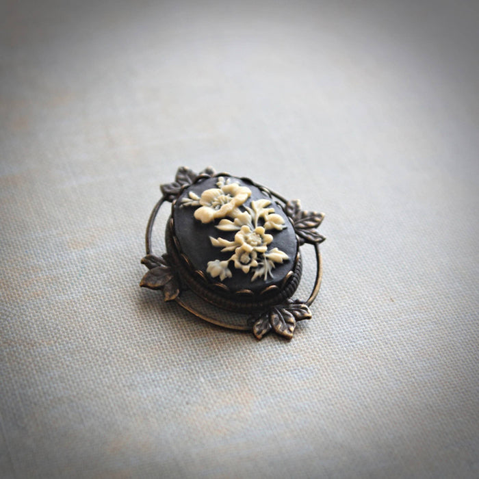 Circa 1890 - Petite Black and Ivory Floral Brooch Pendant